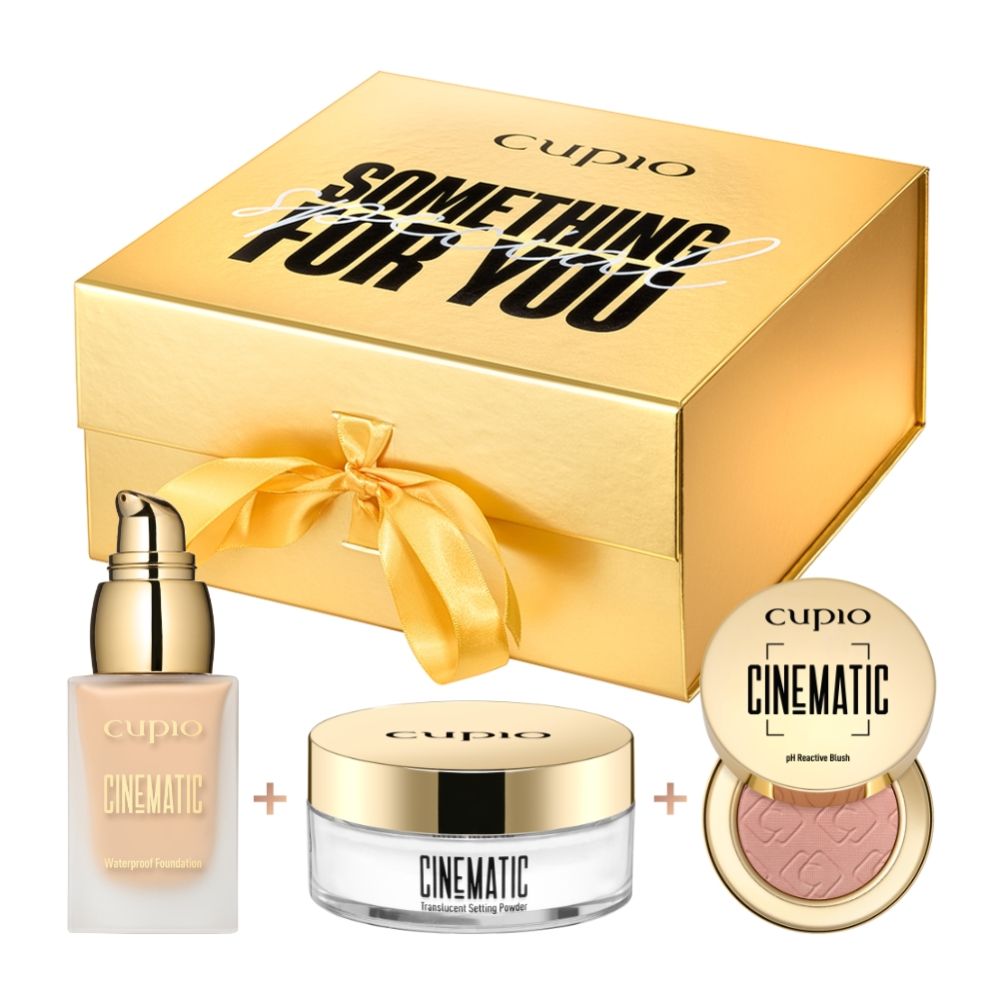 Goldene Geschenkbox mit Cupio Cinematic Make-up Set, enthält wasserfeste Foundation, translucent Setting Powder und pH reaktiven Blush.