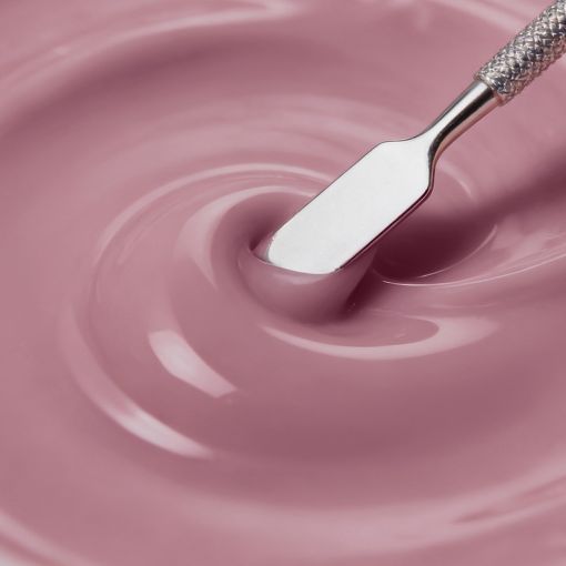 Metallspatel in cremigem rosafarbenem UV-Gel, ideal für Nageldesign, Gelmodellage und Studio-Anwendungen