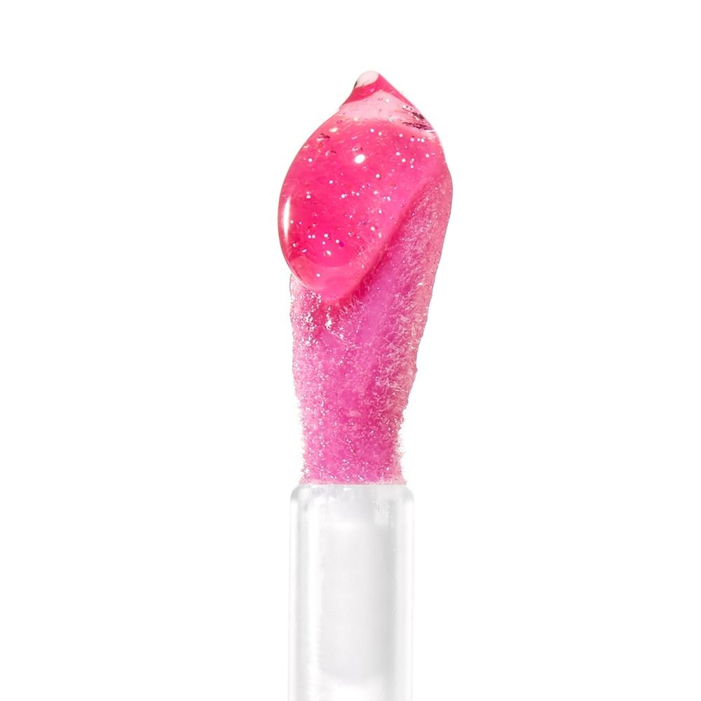 Nahaufnahme von rosa Lipgloss mit Glitzer auf einem Applikator