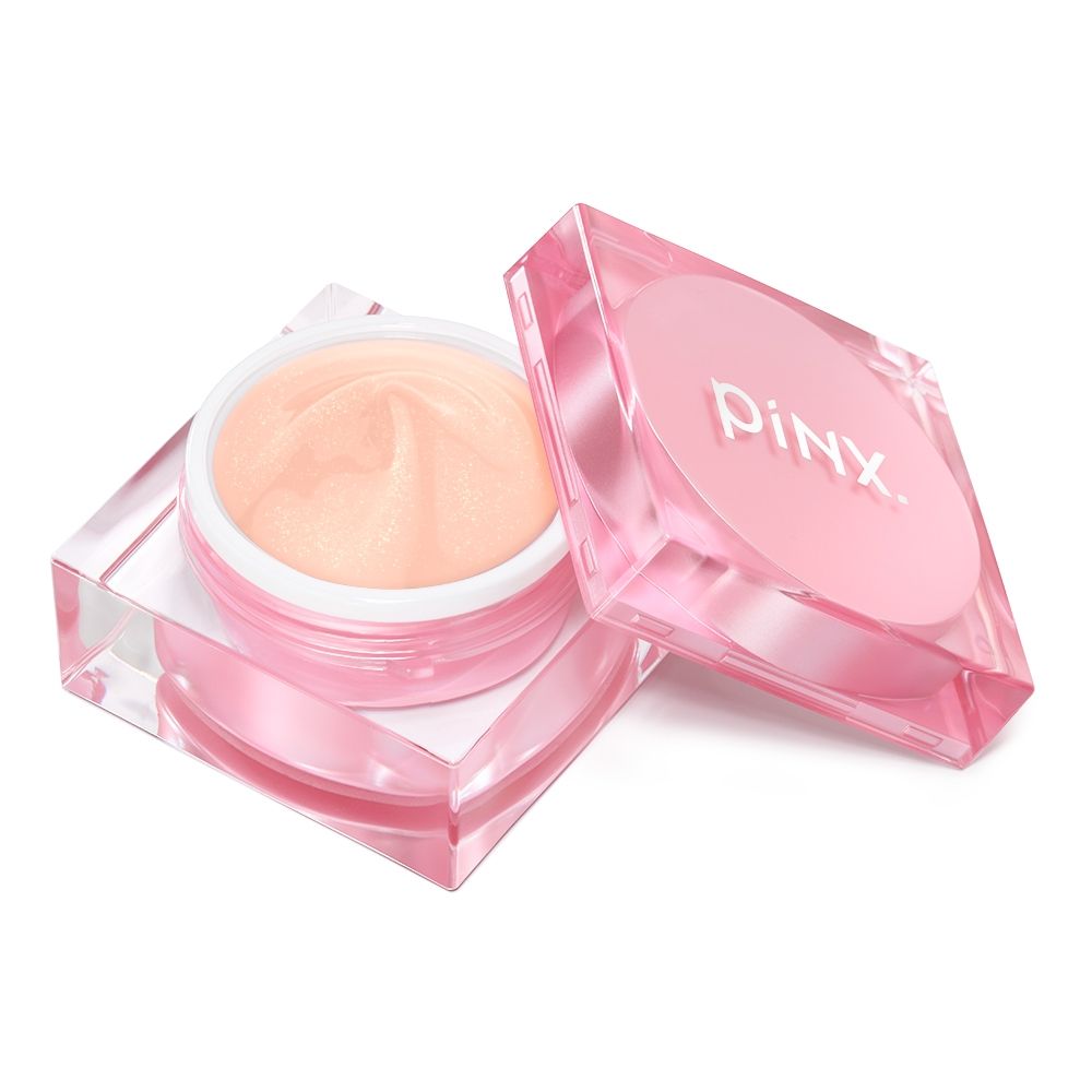 Offener PINX Tiegel mit rosa Gesichtscreme