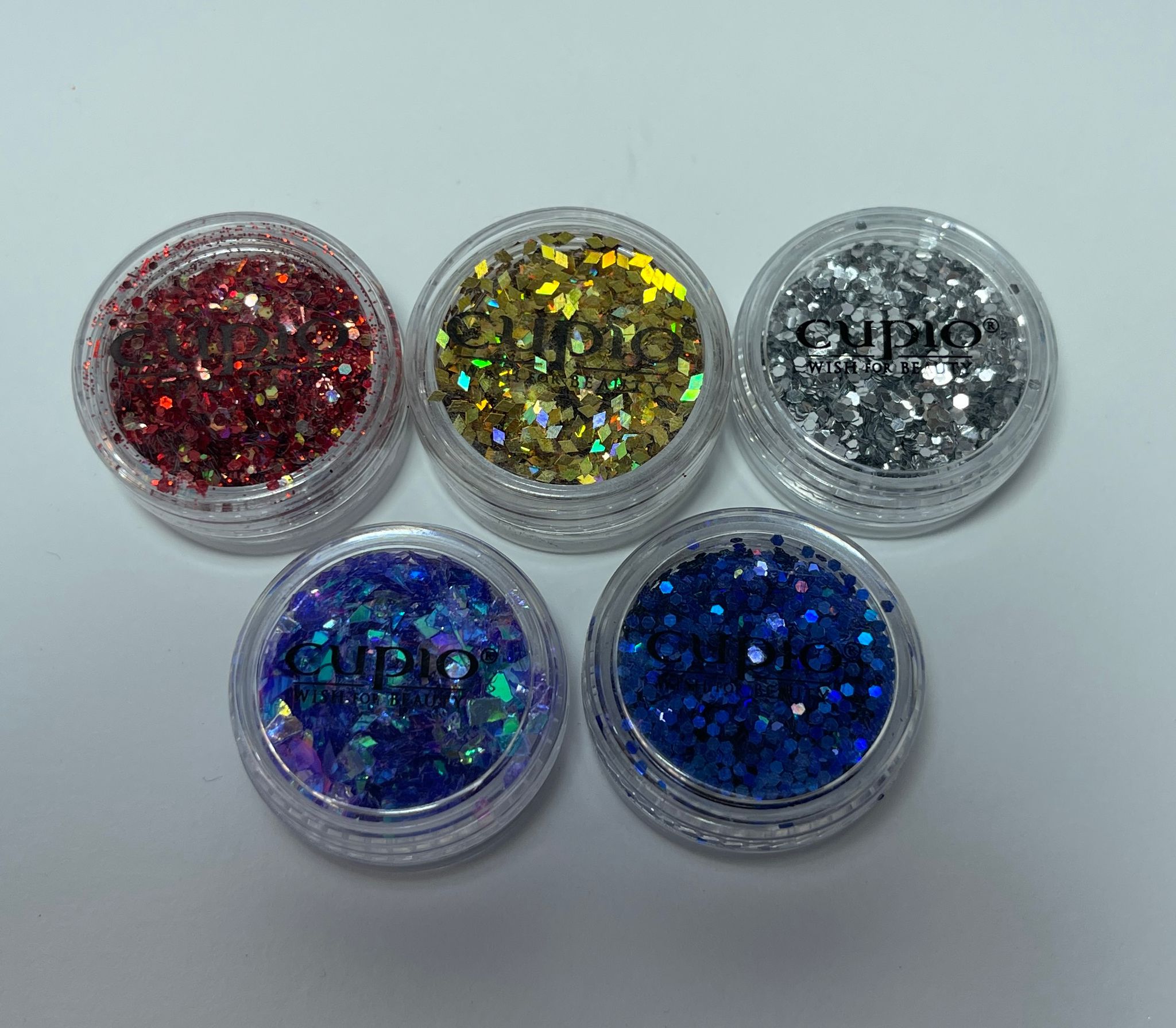 Set aus fünf bunten Glitzer-Pailletten in rot, gold, silber, blau und lila
