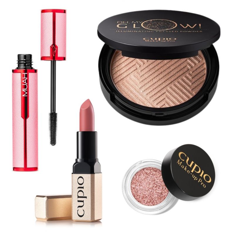 Makeup-Ausrüstung mit Mascara, Lippenstift, Highlighter und Glitter-Augenfarbe