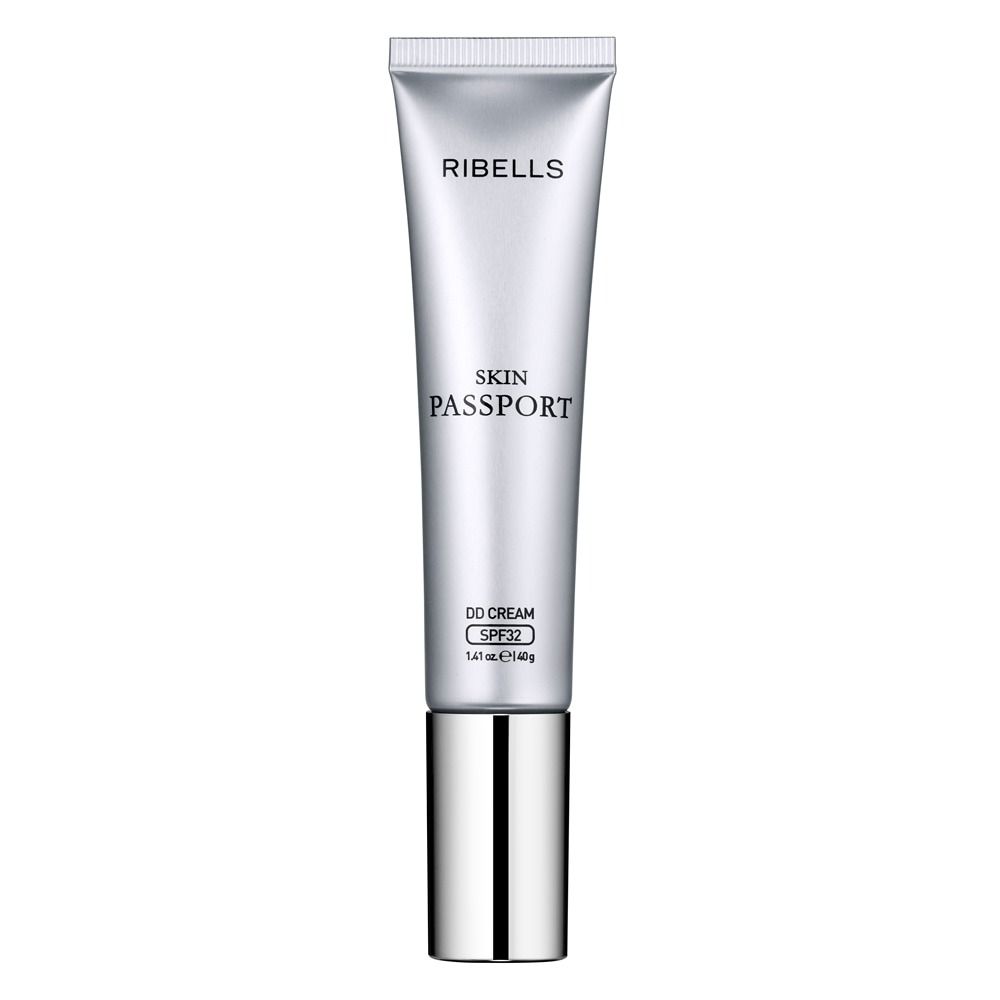Silberne Tube der DD Cream Ribells Skin Passport Medium Plus Security von Cupio, leichte DD-Creme mit SPF 32 für ebenmäßigen Teint, Feuchtigkeit und täglichen Sonnenschutz