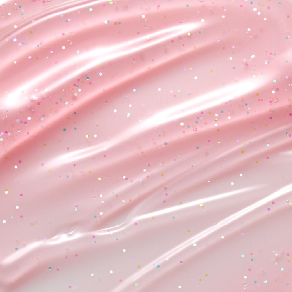 Nahaufnahme von pinkem Gel mit feinem Glitzer und glänzender Oberfläche