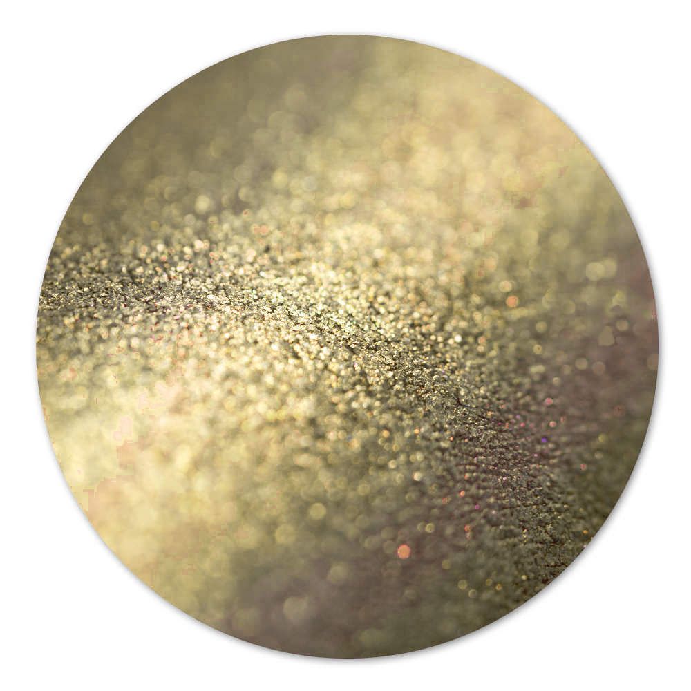 Nahaufnahme von goldenem Glitzer auf einer Oberfläche