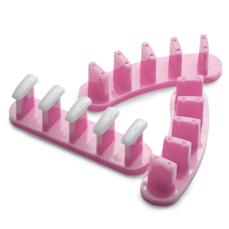 Set mit pinken Nagelhaltern für präzises Nageldesign