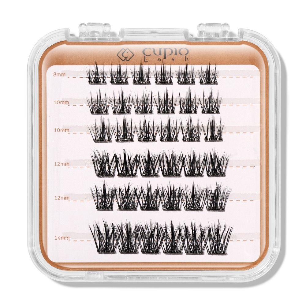 Nahaufnahme einer Cupio Lash Box mit schwarzen Wimpernbüscheln in verschiedenen Längen: 8 mm, 10 mm, 12 mm und 14 mm