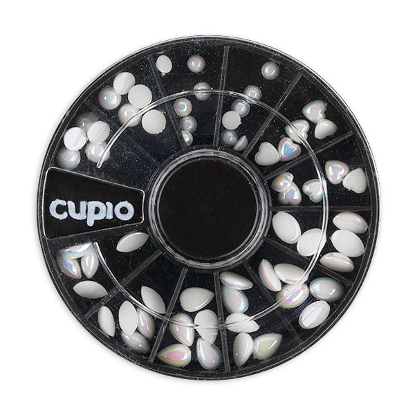 Runde Dose mit Cupio Nail Art Verzierungen in Herz- und Tröpfchenform
