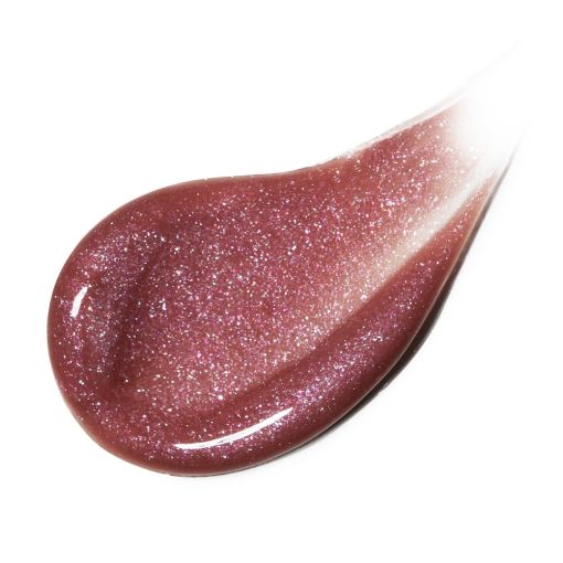 Nahaufnahme eines glitzernden Lipgloss-Tropfens in einem warmen Roseton