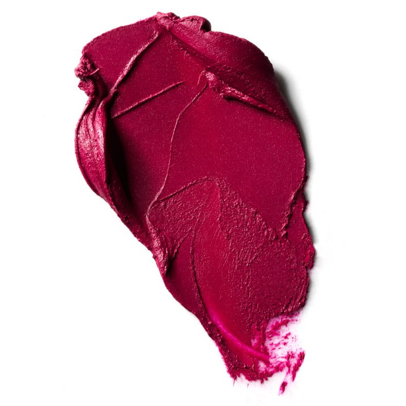 Ein leuchtender, cremiger Lippenstift in einem tiefen Magentaton.