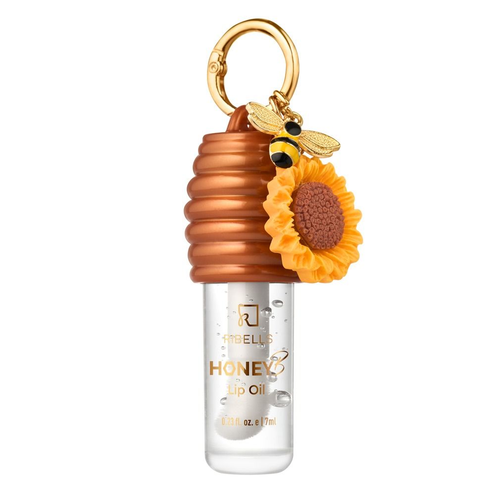 Transparentes Ribells Honey B Lip Oil 7 ml mit brauner Bienenstock-Kappe, goldenem Schlüsselring, Bienen-Anhänger und Sonnenblume
