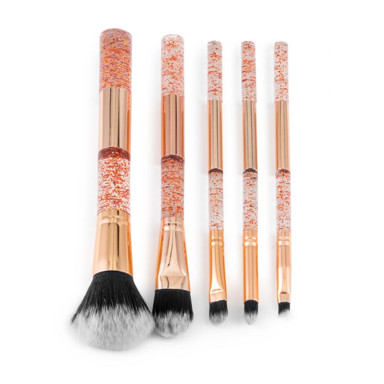 Make-up Pinselset mit fünf Pinseln und stilvollen Glitzergriffen in Roségold.
